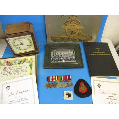A group of 7 medals to Robert A Jerrold of the Royal Horse Artillery, this lot includes photo, certificates, a Desert Rat’s cloth badge and other items associated to the recipient and the Sphinx battery