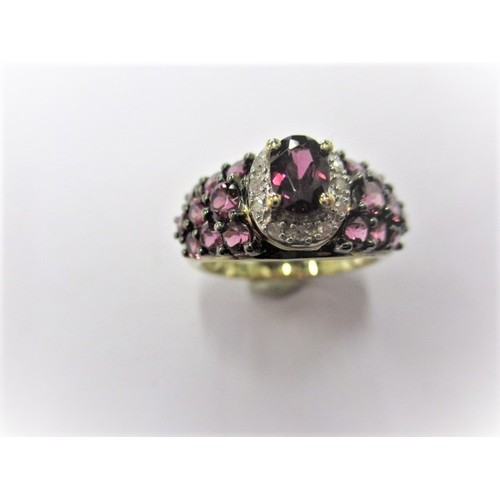 35 - A 9ct yellow gold, diamond and deep pink tourmaline dress ring, approx. ring size ‘M’ approx. weight... 