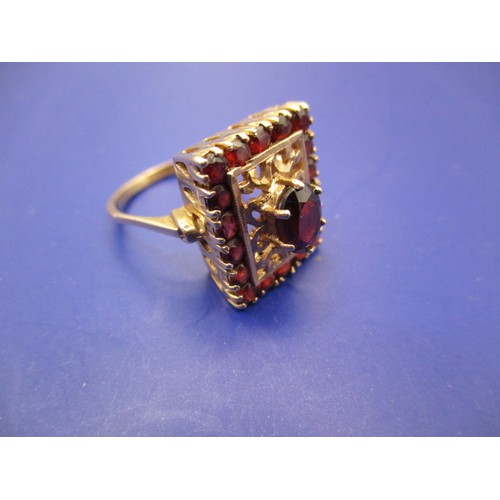 40 - A vintage 9ct yellow gold and garnet dress ring, approx. ring size ‘P’ approx. weight 5.2g in good p... 