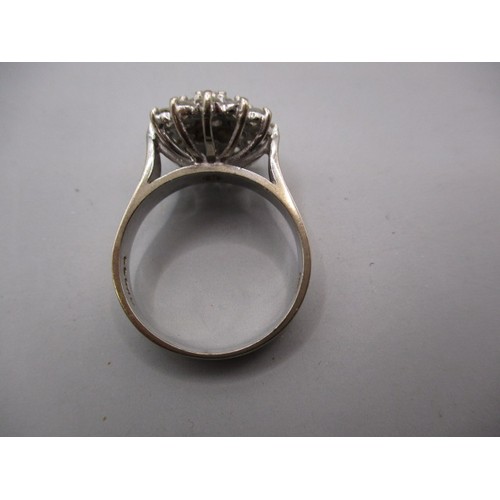 41 - An 18ct white gold and diamond daisy cluster ring, approx. ring size ‘O’ approx. weight 5.7g in good... 