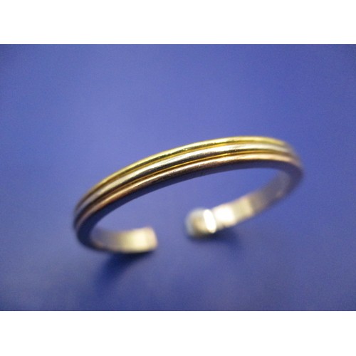 34 - A Cartier 18ct tri colour gold ring, approx. weight 4.3g, marked inside 1988 E10769, having been cut... 