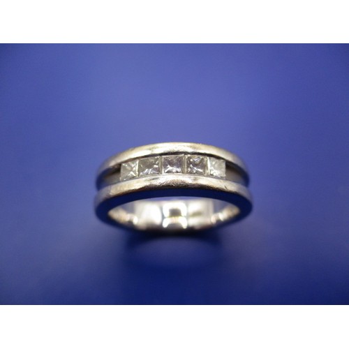 7 - An 18ct white gold half eternity ring set with 5 princess cut diamonds, approx. 0.5cts in total, app... 
