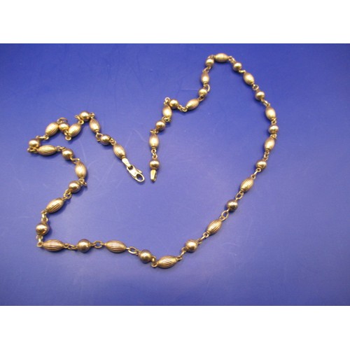 63 - A vintage 9ct gold necklace, approx. linear length 56cm approx. weight 18.2g in good pre-owned condi... 