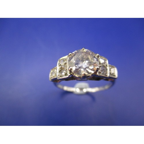 11 - An art deco platinum 7 stone diamond ring, approx. ring size K+, the central stone being a round old... 