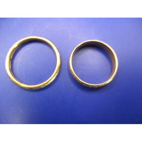 41 - Two vintage yellow gold wedding bands, one with worn marks the other marked for 22ct approx. cross w... 
