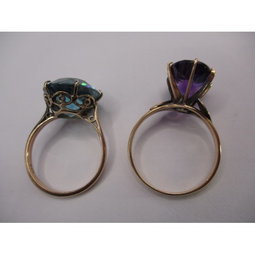 14 - Two yellow gold dress rings each with a large stone, one on 9ct the other 18ct, approx. ring sizes R... 