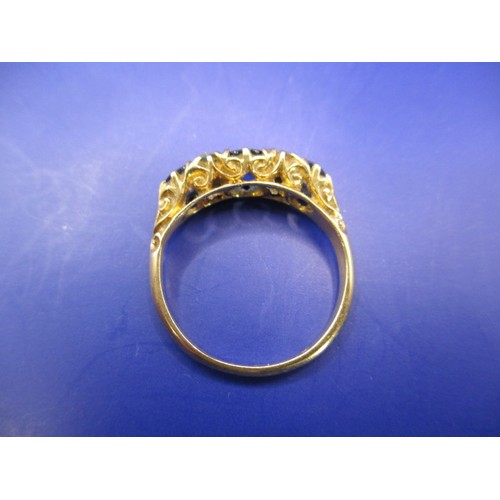 15 - An 18ct? yellow gold diamond and sapphire ring, approx. ring size J approx. weight 2.7g, marks worn ... 