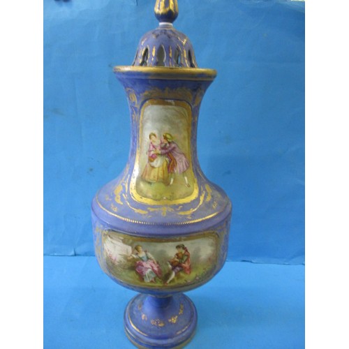 311 - A large continental ceramic lidded pot, approx. height 56cm. In good pre-owned condition with wear t... 