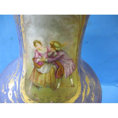 311 - A large continental ceramic lidded pot, approx. height 56cm. In good pre-owned condition with wear t... 