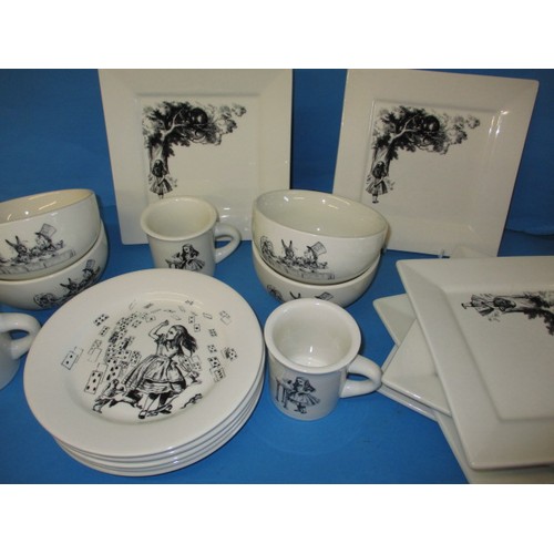 312 - A parcel of Fishs Eddy, Alice in Wonderland tablewares, to include plates, bowls and mugs, in near u... 