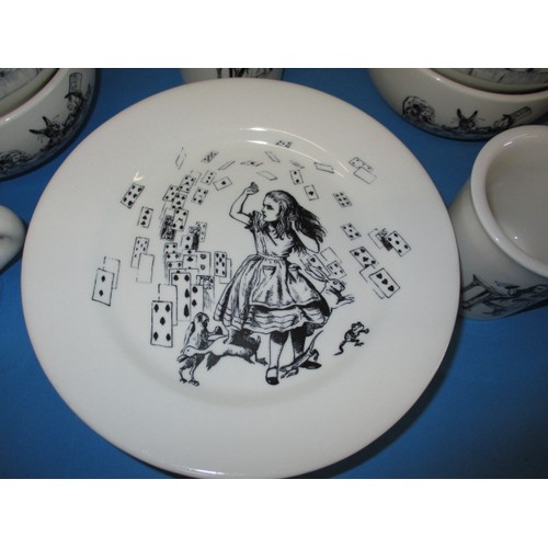 312 - A parcel of Fishs Eddy, Alice in Wonderland tablewares, to include plates, bowls and mugs, in near u... 