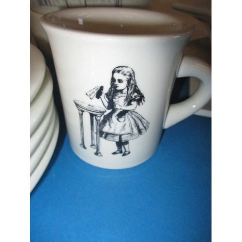 312 - A parcel of Fishs Eddy, Alice in Wonderland tablewares, to include plates, bowls and mugs, in near u... 