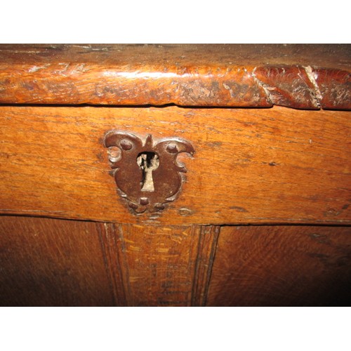 320 - A late 18th/early 19th century large oak panel constructed coffer, approx. dimensions length 140cm, ... 