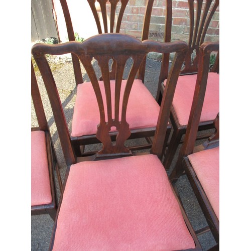 314 - A set of six early 19th Century mahogany dining chairs, with upholstered drop in pads. In good useab... 