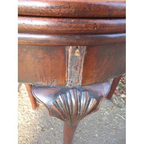 317 - An early 19th century Georgian oak tea/card table with double fold out surfaces, approx. diameter op... 