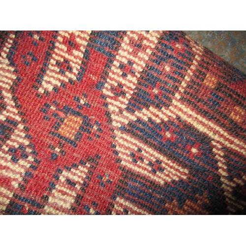 309 - A vintage wool rug, approx. size 290x170cm in good pre-owned condition with use-related marks