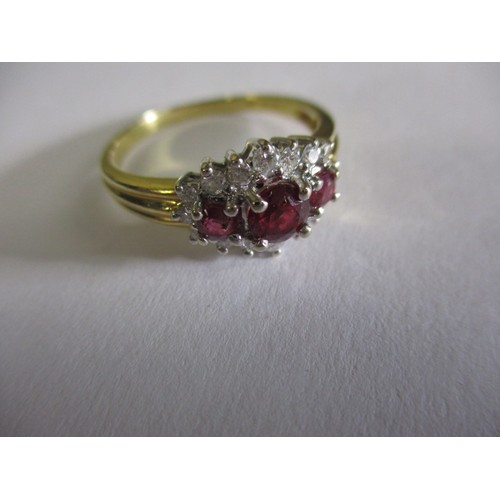 29 - An 18ct yellow gold diamond and ruby dress ring, approx. ring size ‘R’, approx. weight 3.9g, in good... 