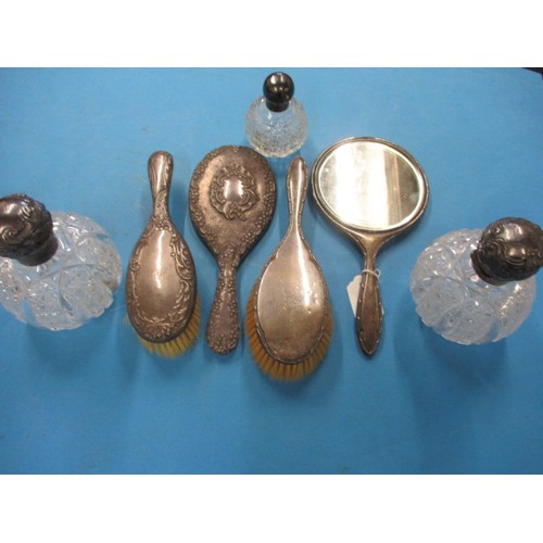 117 - A parcel of sterling silver mounted dressing table items, to include 3 perfume bottles and a brush s... 