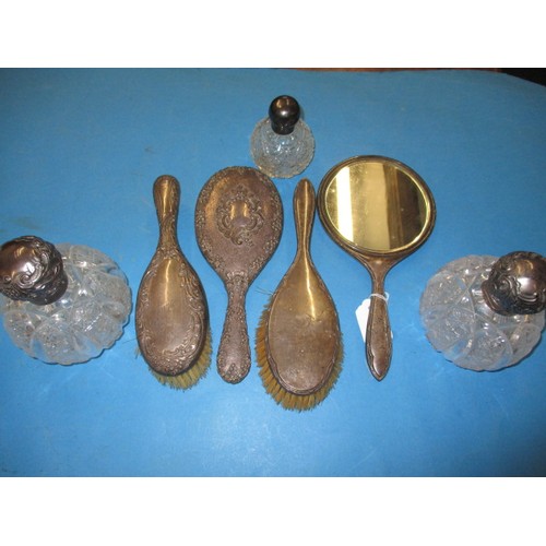 117 - A parcel of sterling silver mounted dressing table items, to include 3 perfume bottles and a brush s... 