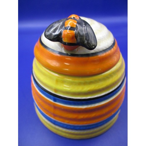 174 - A 1930s Clarice Cliff shape 557 Bee Hive honey pot, in the Liberty banding design, being the larger ... 