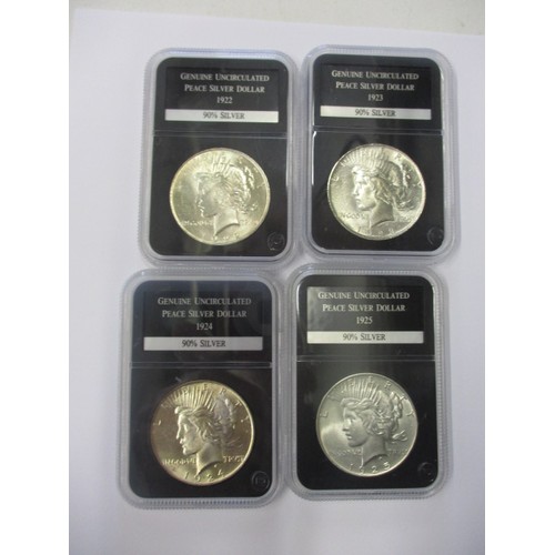 105 - 4 Uncirculated ‘peace’ silver dollars, consecutive dates 1922-1923-1924-1925 each in a plastic capsu... 