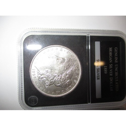 106 - 3 Uncirculated ‘Morgan’ silver dollars, dated 1888-1889-1898, each in a plastic capsule