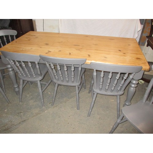 300 - A pine kitchen table with painted legs and 6 chairs, approx. dimensions: Length 179cm Width 89cm Hei... 