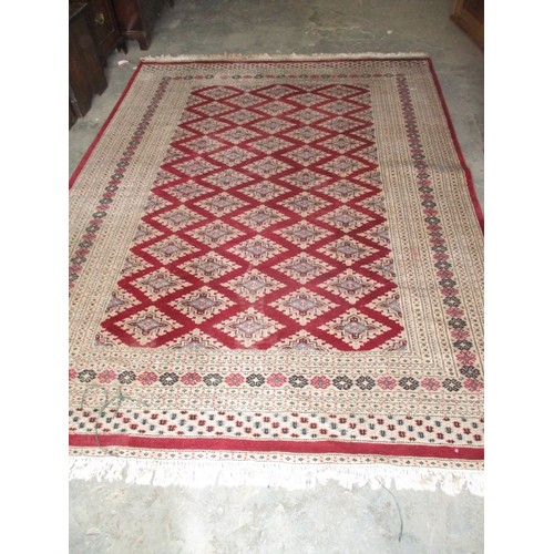 272 - A vintage hand woven Persian wool rug, approx. size  260x190cm, in useable condition with even colou... 