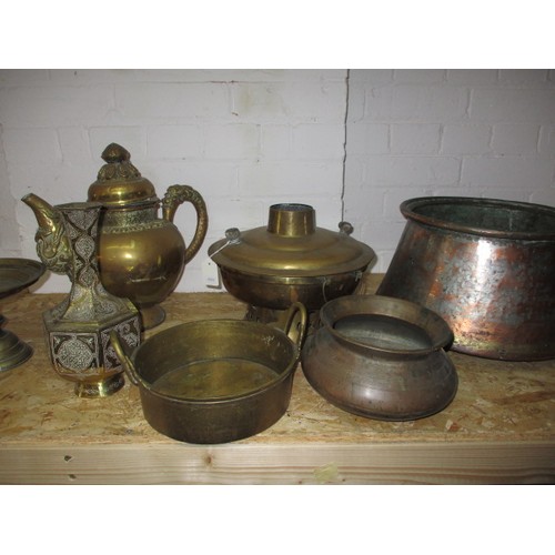 252 - A quantity of brass and copper items, to include an African food steamer, all with general age-relat... 