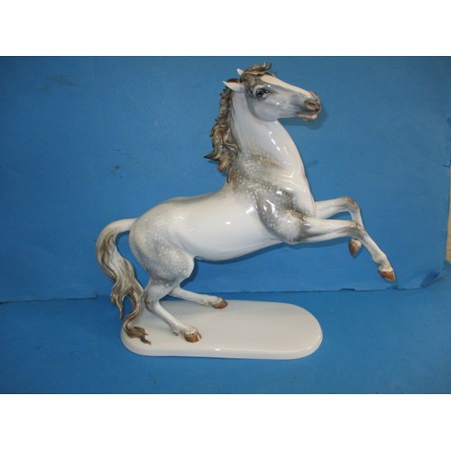 176 - A large Rosenthal porcelain horse figurine, in good condition with no observed damage or restoration... 