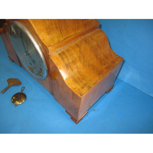 285 - A mid-century walnut cases Westminster chime mantle clock, in current working order, having geometri... 