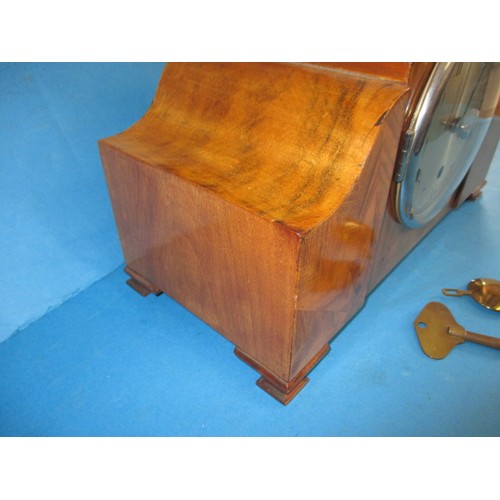 285 - A mid-century walnut cases Westminster chime mantle clock, in current working order, having geometri... 