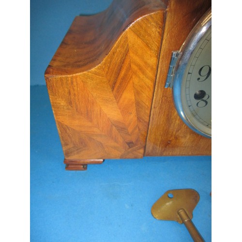 285 - A mid-century walnut cases Westminster chime mantle clock, in current working order, having geometri... 