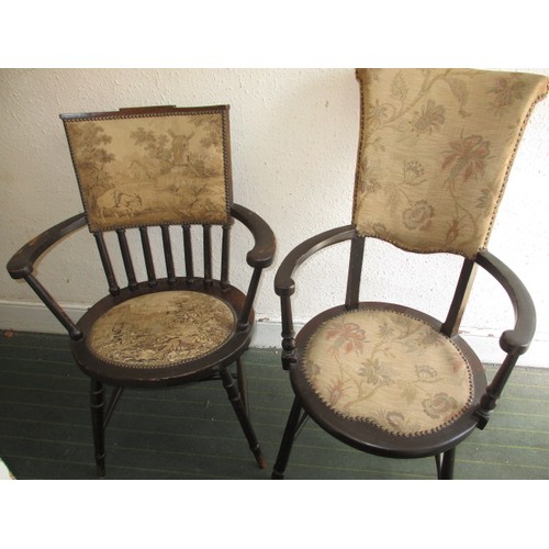 278 - Two vintage open arm chairs with upholstered seat pad and backs, both with metal labels for Trevor P... 