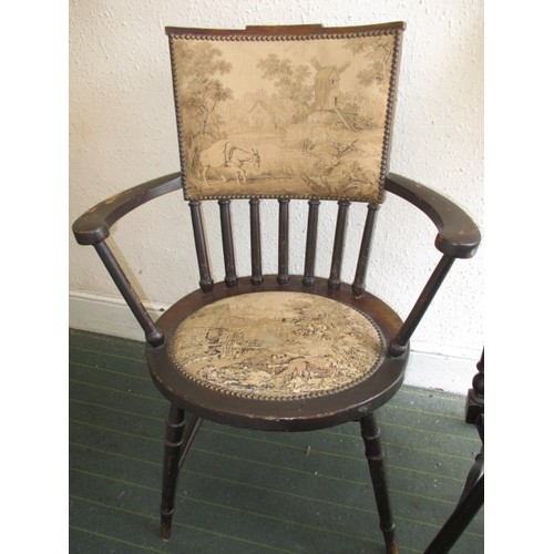 278 - Two vintage open arm chairs with upholstered seat pad and backs, both with metal labels for Trevor P... 