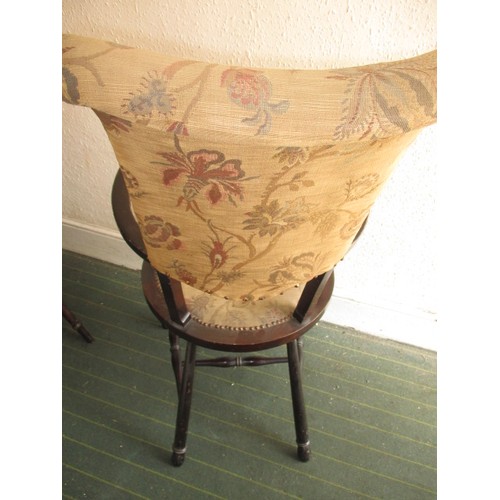 278 - Two vintage open arm chairs with upholstered seat pad and backs, both with metal labels for Trevor P... 