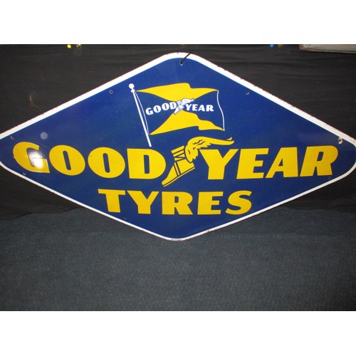 267 - A large vintage enamel advertising sign for Good Year Tyres, being lozenge shaped, approx. size 152x... 