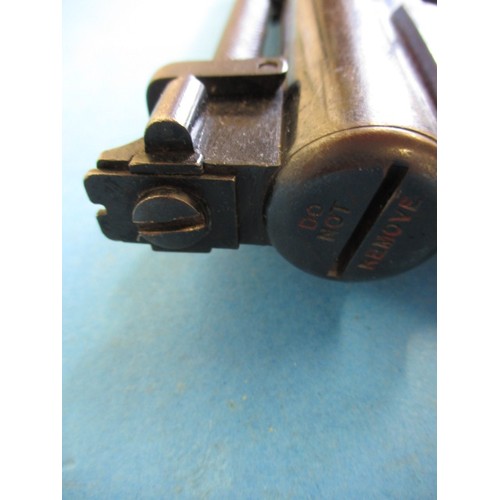 224 - A vintage Webley & Scott “Senior” .177 top loading air pistol, in working order with use related mar... 