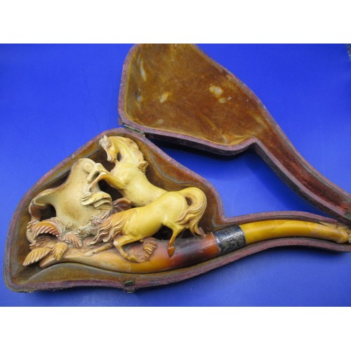 164 - A 19th century carved meerschaum pipe with silver mount and original case, in good used condition, a... 