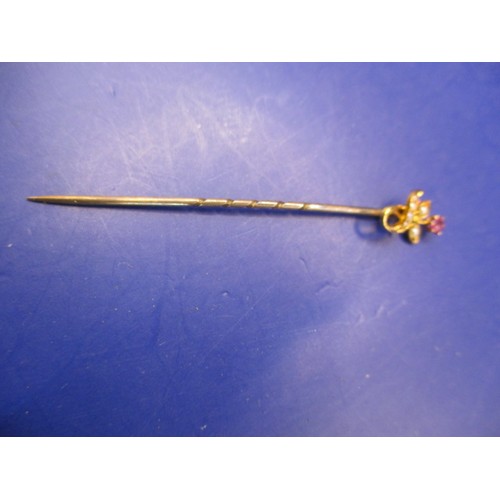 44 - A 15ct yellow gold topped stick pin with seed pearls and a ruby, and a white metal Scottish brooch