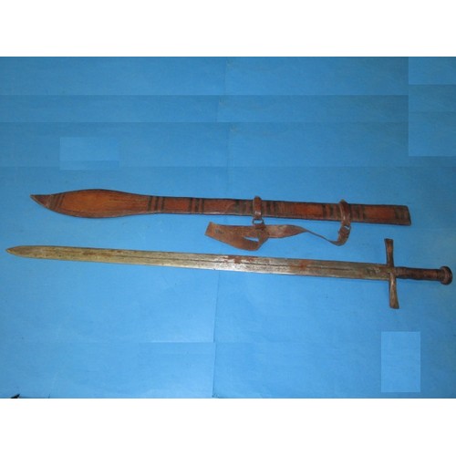 200 - A late 19th early 20th century Sahara Kaskara sword with lion mark and leather scabbard, approx. 99c... 