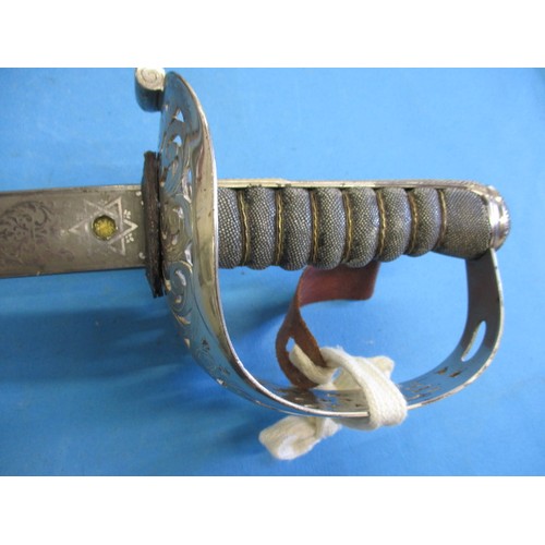 202 - An early 20th century Edward VII, cavalry dress sword with decorative etched blade, approx. length 1... 