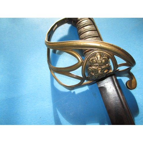 205 - An antique cavalry sword with etched blade marked H Luckman, the blade in good condition, the basket... 