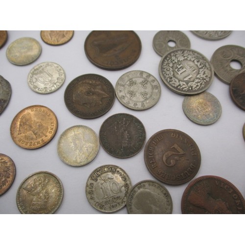 140 - A parcel of vintage coins, to include an Elizabeth I silver hammered example, all in circulated cond... 