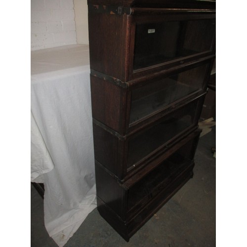 310 - A vintage four stack Globe Wernicke bookcase with top cap and bottom plinth, missing bottom door and... 