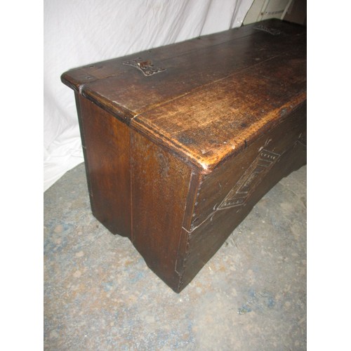 308 - A vintage country house elm coffer, with geometric carved front. Split to one side. Width 92cm, Dept... 