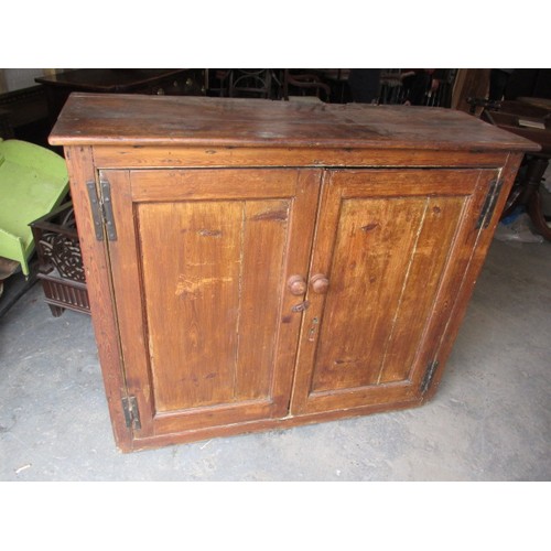 315 - A 19th Century wax pine country house 2 door kitchen cupboard. In useable condition with age related... 