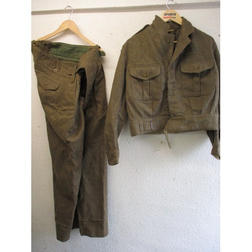 207 - A British Army 1949 pattern battledress blouse and trousers, in good useable pre-owned condition, si... 