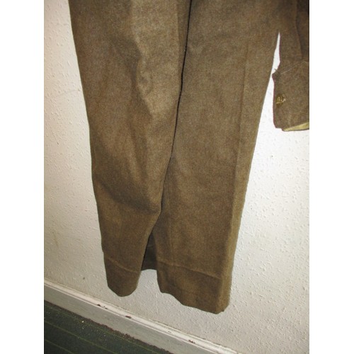 207 - A British Army 1949 pattern battledress blouse and trousers, in good useable pre-owned condition, si... 