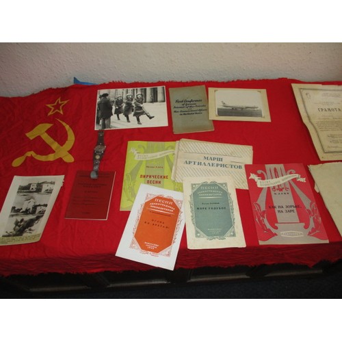 216 - A parcel of vintage Soviet Union items, to include a military watch, flag and ephemera, all in pre-o... 